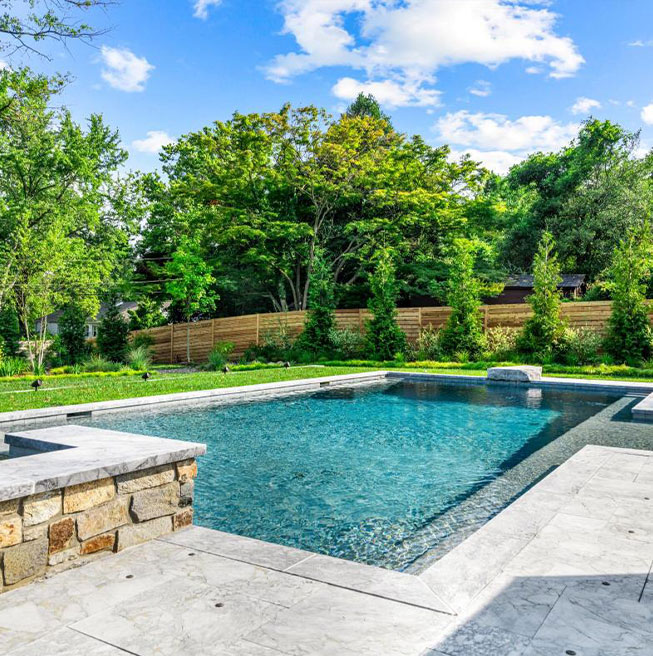 Modern outdoor retreat with a beautifully designed pool