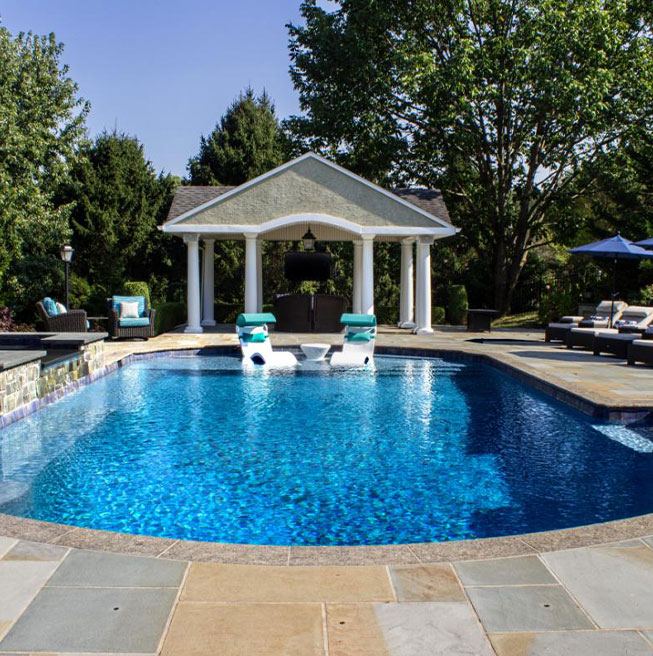 Relaxing backyard paradise with a stunning CCS pool