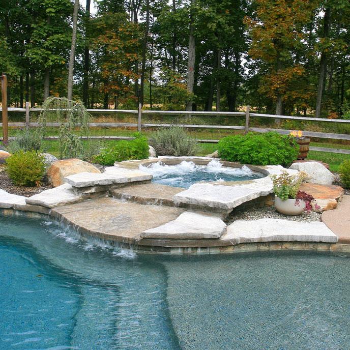 free form pool with natural a stone