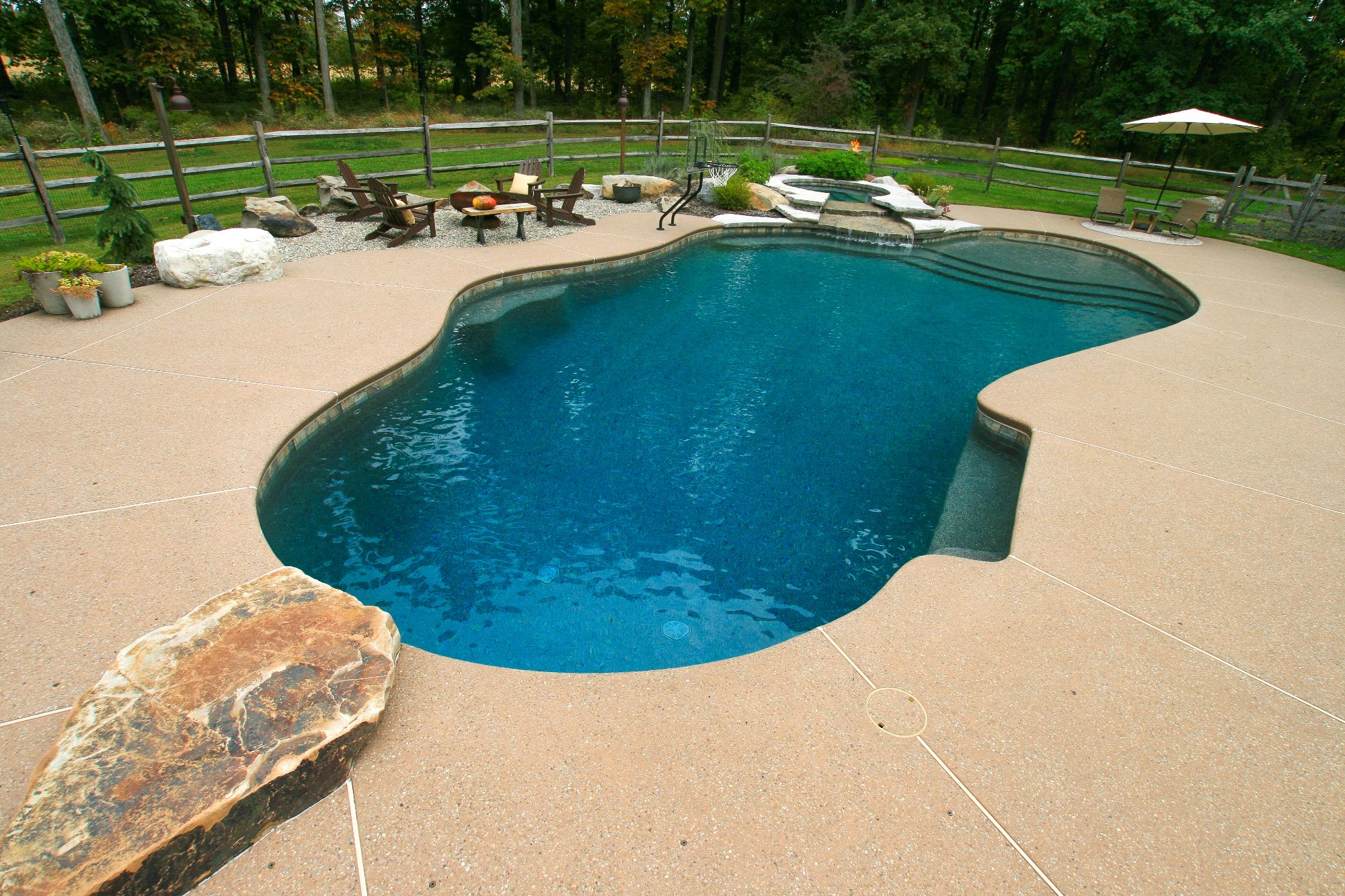 free form pool with natural a stone